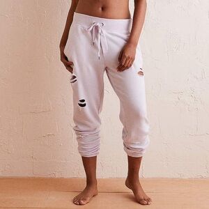 Aerie distressed joggers in crème.